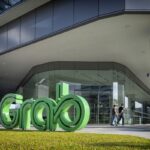 Ride-Hailing Giant Grab Reports Reduced Q3 Losses Grab