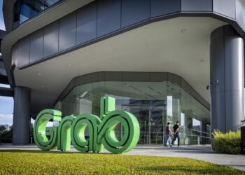 Ride-Hailing Giant Grab Reports Reduced Q3 Losses