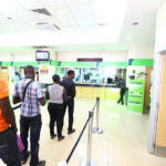 Nigerian Banks and Neobanks Clash, Consumers Caught in the Crossfire Customers-queue-up-inside-KCB-bank-2