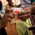 Nigerians React To FG's Imposed Levy On Recipients To Electronic Money Transfer cash-transfer