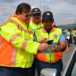 SA e-Government Prepares To Deploy High-End Security Gadgets For e-Policing minister_grant_chief_africa_and_a_traffic_officer_with_the_new_hand-held_device_3_0