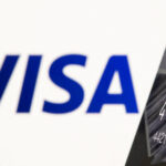 Visa Establishes Its First Africa Data Centre in Johannesburg FILE PHOTO: Credit card is seen in front of displayed Visa logo in this illustration