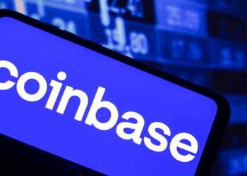 Coinbase to Cut 14% of Staff as AI Reshapes How it Works
